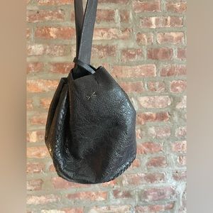 Volta Atelier wrist bag in black leather